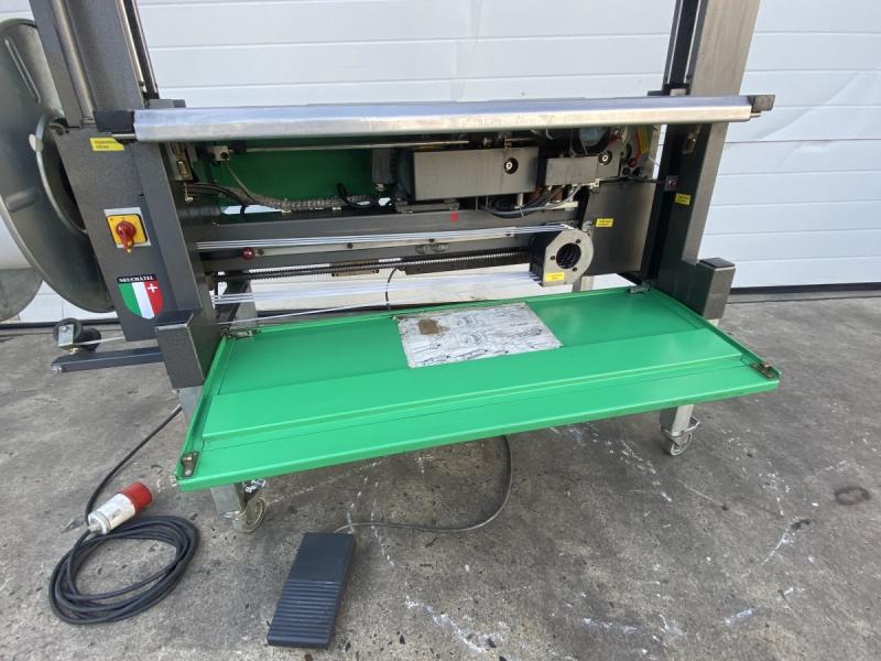 Umreifungsgerät, Umreifungsmaschine für Kunststoffband, Verpackungsmaschine mit Zubehör